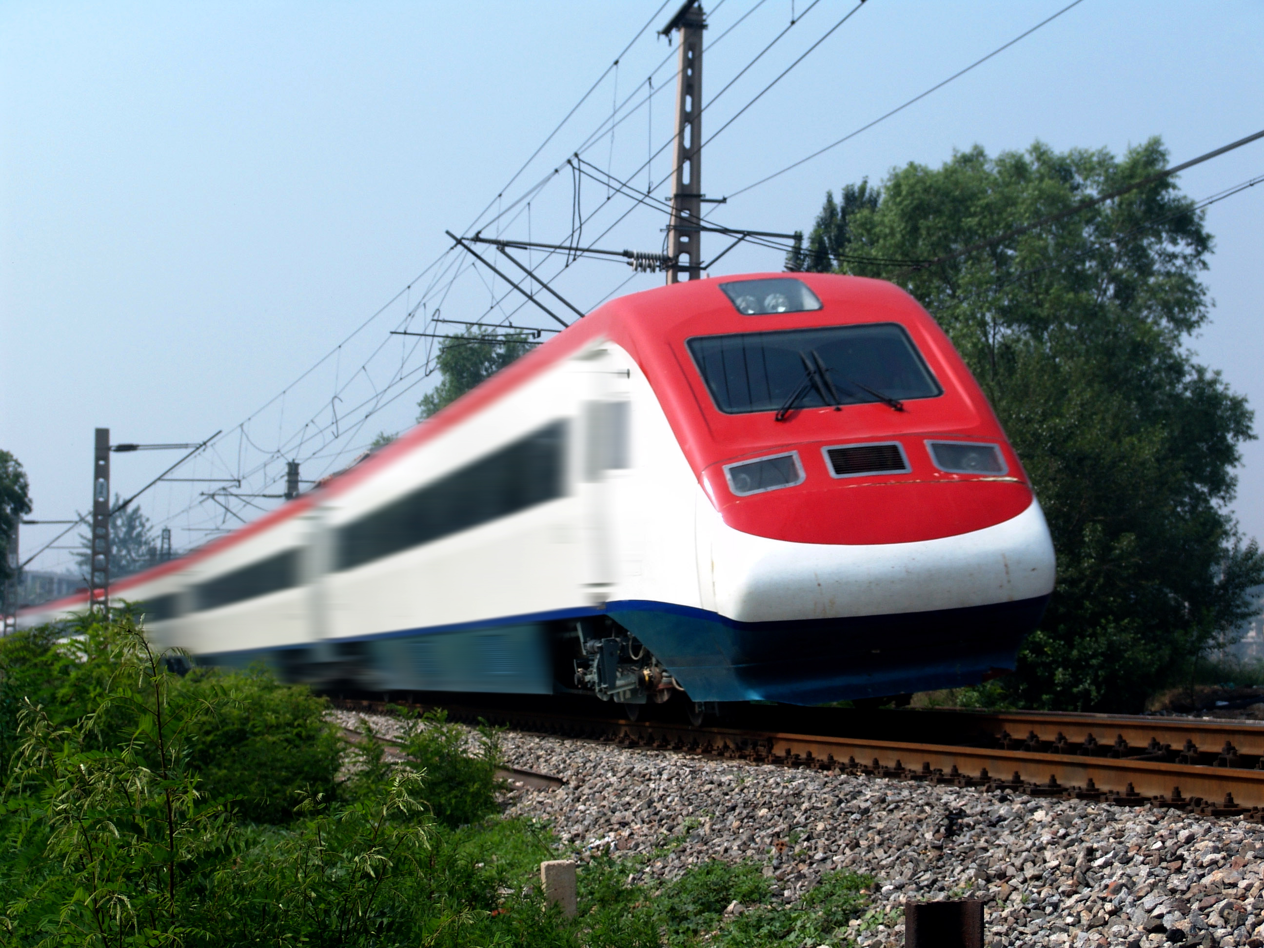Power-distributed tilting diesel multiple unit (DMU)
